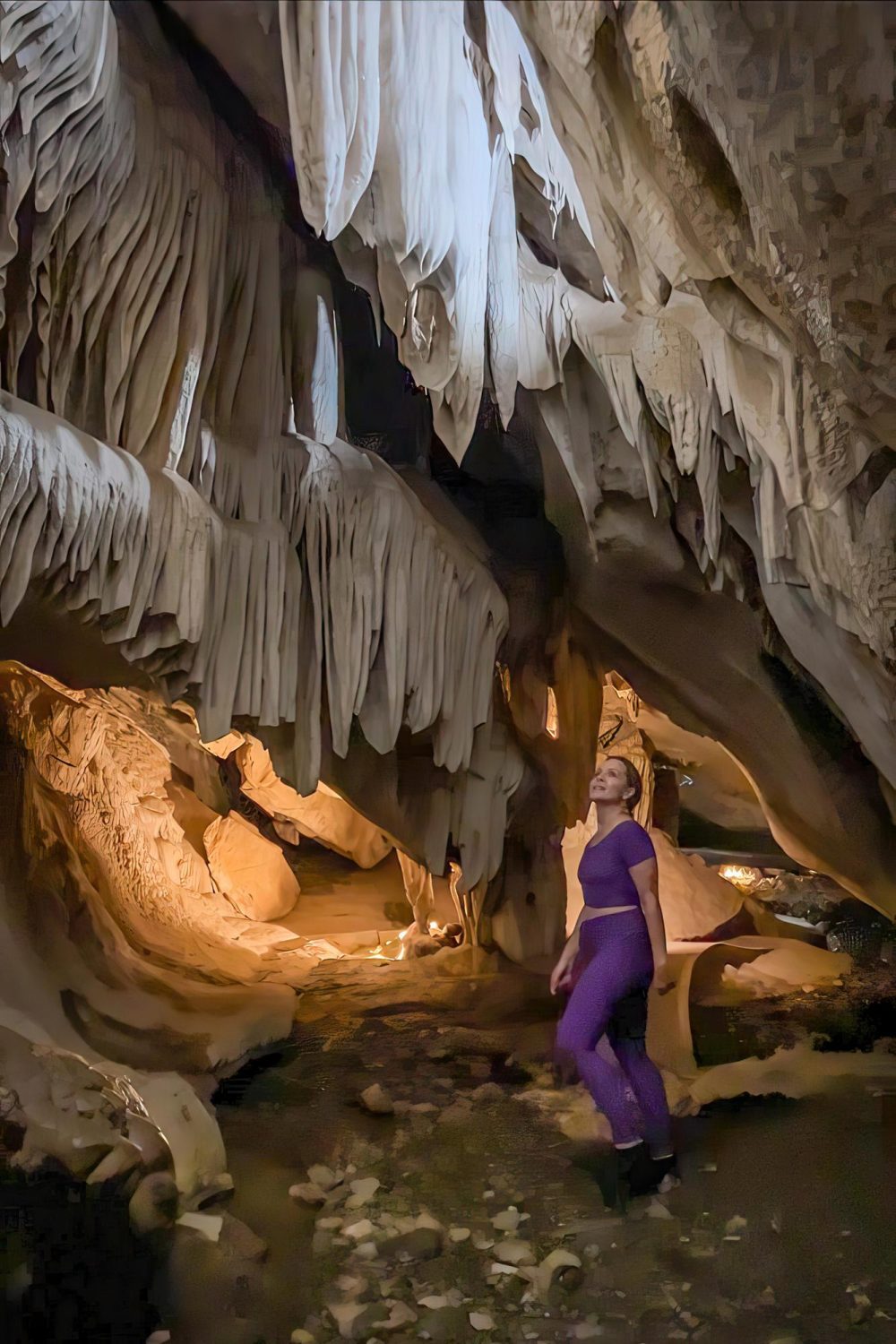 The warmly lit stalactites and stalagmites of Boyden Cavern in Kings Canyon National Park.